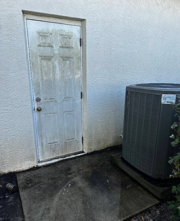 Home exterior before cleaning